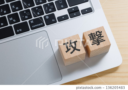 A block with the word "attack" written on it on a computer A block with the word "attack" written on it on a computer 136205483