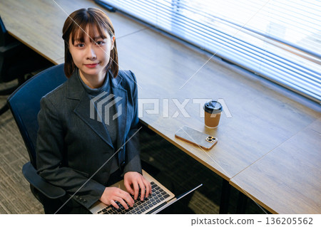 Woman working in the office 136205562
