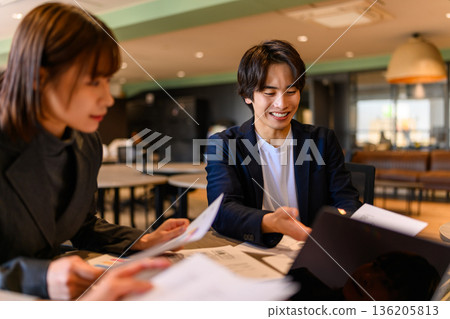 Meeting scene in the office 136205813