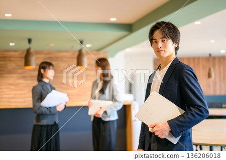 Confident male business person Confident male business person 136206018