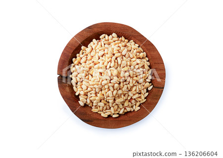 peeled pine nuts, in a wooden bowl, on a white background, isolate, close-up, no people, peeled pine nuts, in a wooden bowl, on a white background, isolate, close-up, no people, 136206604