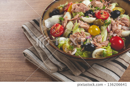 salad with canned tuna, vegetable salad with quail eggs, lettuce, red onion , cherry tomatoes , olives, keto food, healthy food, homemade, no people 136206641