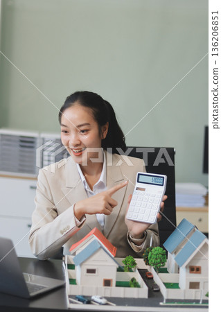 real estate agent home miniature model on documents sale and purchase of apartment notarial deed real estate agent home miniature model on documents sale and purchase of apartment notarial deed 136206851