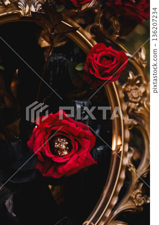 Gothic Halloween Table Setting with Skulls and Red Roses Gothic Halloween Table Setting with Skulls and Red Roses 136207234
