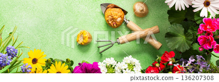 A vibrant balcony is decorated with various spring flowers in full bloom. Gardening tools are placed among the flowers, highlighting a fresh and lively spring ambiance, banner A vibrant balcony is decorated with various spring flowers in full bloom. Gardening tools are placed among the flowers, highlighting a fresh and lively spring ambiance, banner 136207308
