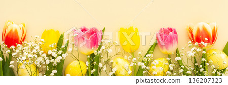 Easter eggs with tulips and gypsophila 136207323