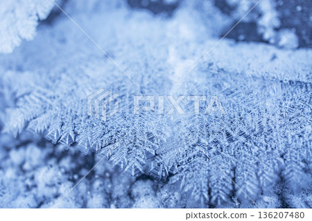 Winter or christmas background with snow crystals closee-up, rime patterns, copy space Winter or christmas background with snow crystals closee-up, rime patterns, copy space 136207480