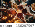 Festive Wine Toast with Friends at Dinner 136207597