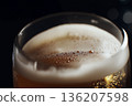 Close-up of foam and bubbles on beer 136207598