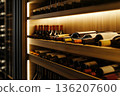 Modern wine cellar with bottle shelves and lighting 136207600