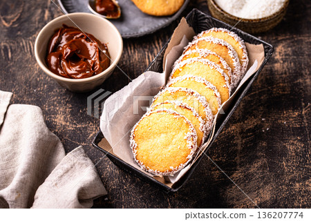Alfajores, traditional Spanish sandwich cookies Alfajores, traditional Spanish sandwich cookies 136207774