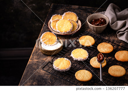 Alfajores, traditional Spanish sandwich cookies Alfajores, traditional Spanish sandwich cookies 136207777