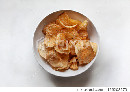 Paprika-flavored snack crackers on a white background Paprika-flavored snack crackers on a white background 136208373