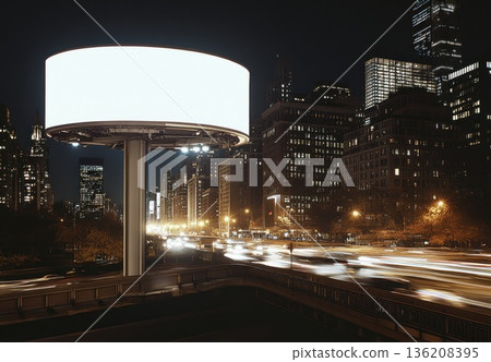 Blank White Billboard at Night in Modern City with Traffic Light Trails 136208395