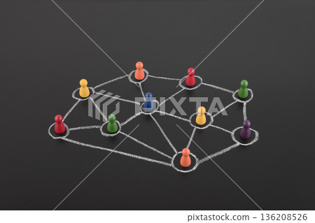 Colorful group of people figures connected with chalk on blackboard. Diversify people and social network concept 136208526