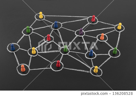 Colorful group of people figures connected with chalk on blackboard. Diversify people and social network concept 136208528