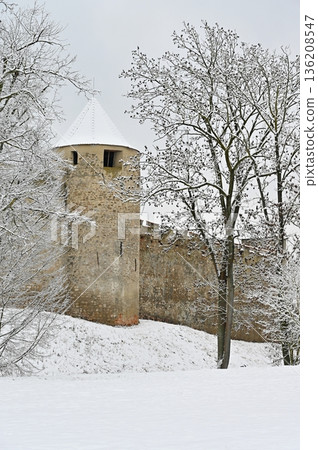 The beautiful old castle of Veveri Brno, Czech Republic. Winter landscape with snow and nature surrounding the castle. The beautiful old castle of Veveri Brno, Czech Republic. Winter landscape with snow and nature surrounding the castle. 136208547