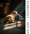 Toddler enjoys story time with a loyal dog in a cozy room 136208656