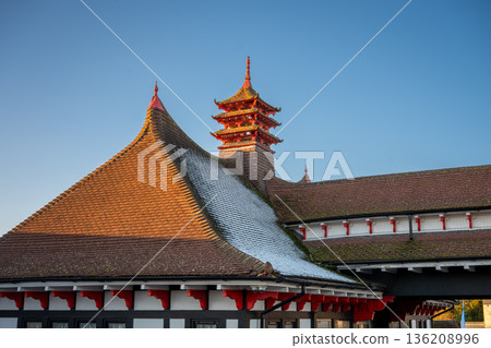 The roof of the former "Chinese Garage" in Beckenham, Kent, UK. This building now houses a supermarket and wine shop. The roof of the former "Chinese Garage" in Beckenham, Kent, UK. This building now houses a supermarket and wine shop. 136208996