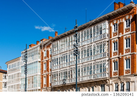 Burgos, Spain: Historic architecture with ornate balconies under a blue sky Burgos, Spain: Historic architecture with ornate balconies under a blue sky 136209141