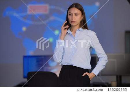 Confident Analyst in Security Operations Center Using Technology for Critical Monitoring 136209565