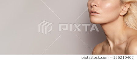 Radiant Skin Showcase. Model With Luminous Complexion. Portrait Of Confident Woman Highlighting Skincare Qualities. Closeup Of Blonde Woman Revealing Natural Beauty And Skincare Glow, Cosmetic Brand Radiant Skin Showcase. Model With Luminous Complexion. Portrait Of Confident Woman Highlighting Skincare Qualities. Closeup Of Blonde Woman Revealing Natural Beauty And Skincare Glow, Cosmetic Brand 136210403