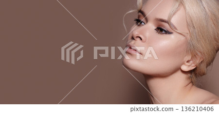 Sophisticated Appearance With Glow. Graceful Female Features Emphasized Through Luminous Makeup Artistry. Elegant Portrayal Of Female Allure Accentuated By Radiant And Shimmering Cosmetic Details Sophisticated Appearance With Glow. Graceful Female Features Emphasized Through Luminous Makeup Artistry. Elegant Portrayal Of Female Allure Accentuated By Radiant And Shimmering Cosmetic Details 136210406