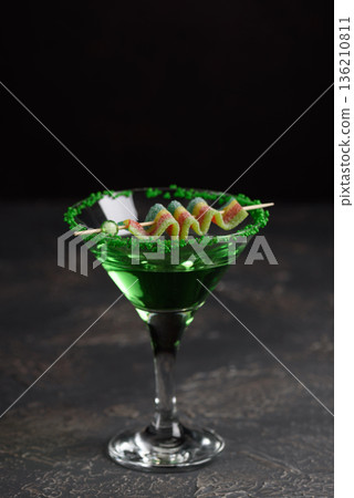Green Cocktails with Rainbow Candy and Shamrocks. Festive St. Patricks Day Celebration Still Life Green Cocktails with Rainbow Candy and Shamrocks. Festive St. Patricks Day Celebration Still Life 136210811