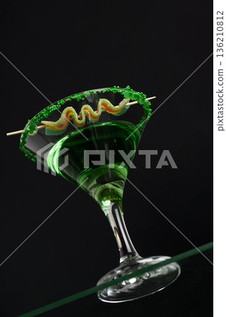 Green Cocktails with Rainbow Candy and Shamrocks. Festive St. Patricks Day Celebration Still Life. Low angle View 136210812