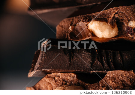 Chocolate bar with whole hazelnut, macro close up Chocolate bar with whole hazelnut, macro close up 136210908