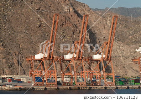 Container cranes lined up at Santa Cruz de Tenerife port, Spain 136211128