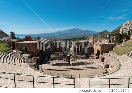 Ancient Greek Theatre of Taormina with Mount Etna in the background, Sicily, Italy Ancient Greek Theatre of Taormina with Mount Etna in the background, Sicily, Italy 136211134