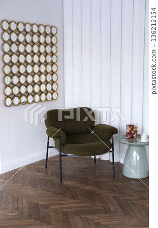 Minimalist interior featuring a cozy green chair and decorative mirrors on the wall, creating a serene atmosphere with ample copy space for design elements Minimalist interior featuring a cozy green chair and decorative mirrors on the wall, creating a serene atmosphere with ample copy space for design elements 136212154