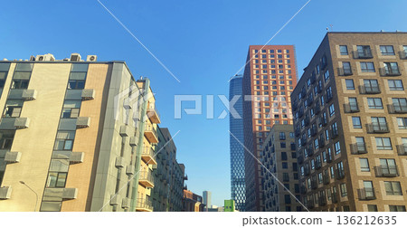 Architecture and real estate, modern residential apartment building with large panoramic windows Architecture and real estate, modern residential apartment building with large panoramic windows 136212635