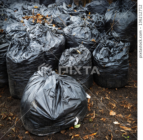 Many garbage bags in the park Many garbage bags in the park 136212712