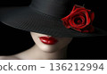 Elegant female model in retro hat with red lips and rose flower posing against a dark background 136212994