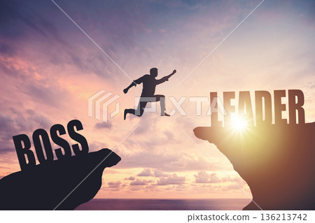 Silhouette of a man jumping from cliff to cliff, business and success concept Silhouette of a man jumping from cliff to cliff, business and success concept 136213742