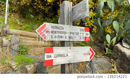 Hiking Trail Signpost in Cinque Terre, Italy with Directions to Vernazza and Corniglia 136214221