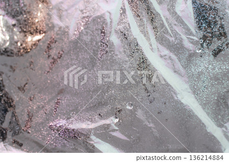 Wet silver foil abstract texture with water bubbles 136214884