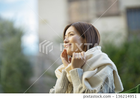 Beauty of a woman in her 40s smiling in the garden Beauty of a woman in her 40s smiling in the garden 136214951