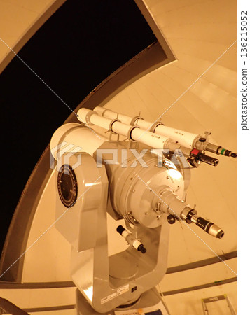 Astronomical telescope looking up at the night sky 136215052