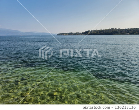 Transparent Lake Water near Stone Shore 136215136