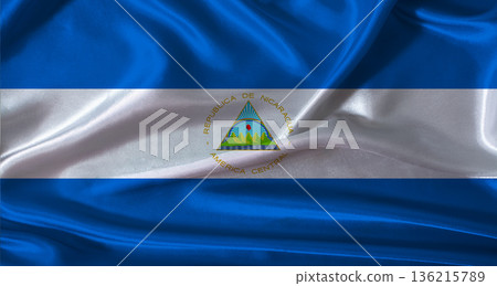 National flag of Nicaragua with cloth texture. Nicaragua flag with realistic texture background National flag of Nicaragua with cloth texture. Nicaragua flag with realistic texture background 136215789