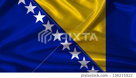 National flag of Bosnia and Herzegovina with cloth texture. Bosnia and Herzegovina flag with realistic texture background National flag of Bosnia and Herzegovina with cloth texture. Bosnia and Herzegovina flag with realistic texture background 136215822
