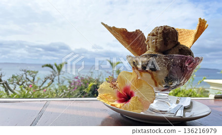 Enjoy tropical ice cream on a terrace overlooking the ocean in Motobu Town, Okinawa Prefecture 136216979