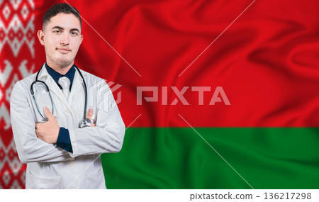 Portrait of medical professional on Belarus flag background. Belarusian national health system 136217298