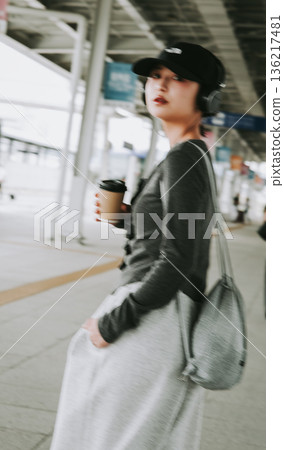 Afterimage of a woman walking at the station ■Photography cooperation: Kansai International Airport (KIX) 136217481