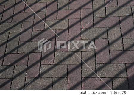 Shadowed brick road Shadowed brick road 136217963