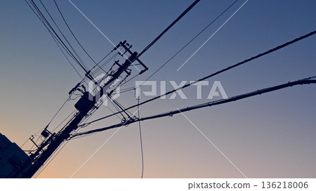 Twilight sky and utility poles Twilight sky and utility poles 136218006