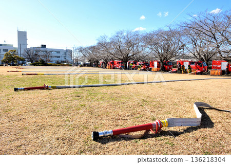 Water hoses placed in preparation for water spraying training at the New Year's Parade Ceremony Water hoses placed in preparation for water spraying training at the New Year's Parade Ceremony 136218304